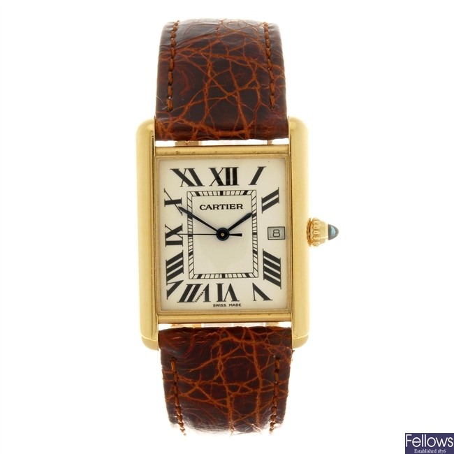 (134181926) An 18k gold quartz Cartier Tank Louis wrist watch.
