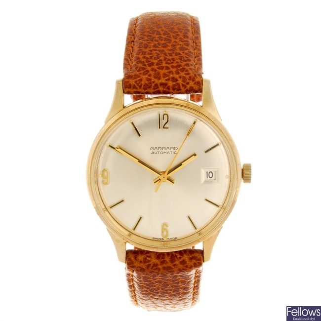 (207316714) A 9ct gold automatic gentleman's Garrard wrist watch.