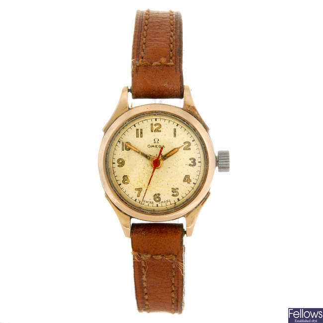 OMEGA - a lady's bi-colour wrist watch.