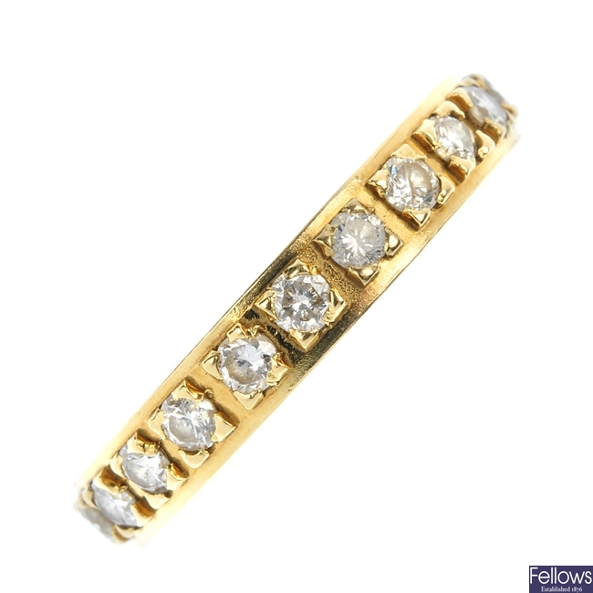 An 18ct gold diamond full-circle eternity ring.