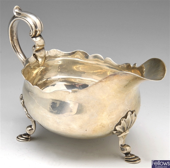 A late Victorian silver sauce boat.