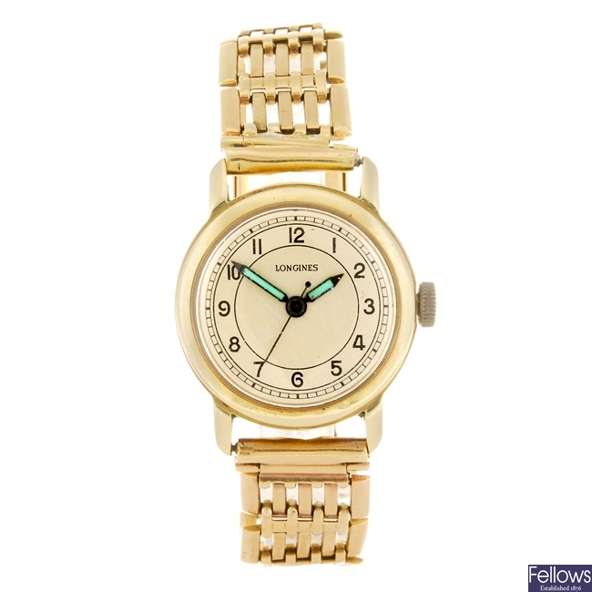 (132649) A 14k gold manual wind gentleman's Longines bracelet watch.