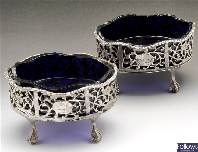 A George III pair of silver open salts with liners.