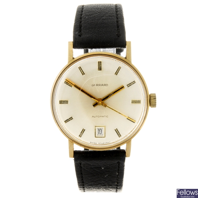 A 9ct gold automatic gentleman's Garrard wrist watch.