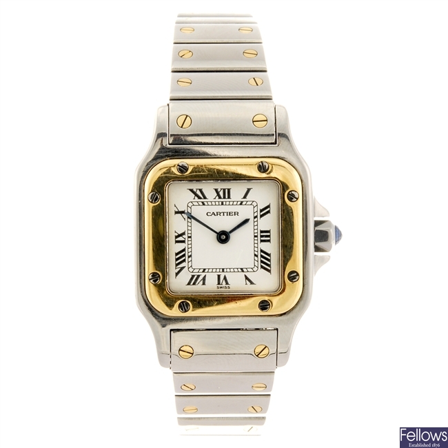 A bi-metal quartz Cartier Santos wrist watch.