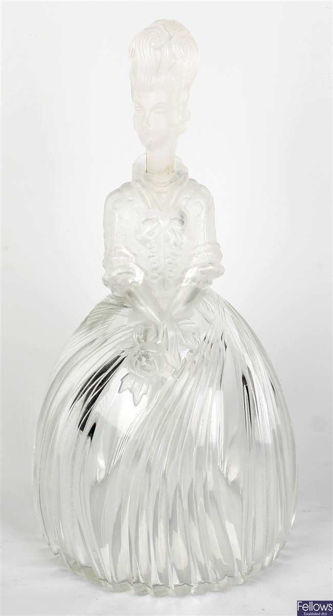 An unusual glass figural decanter