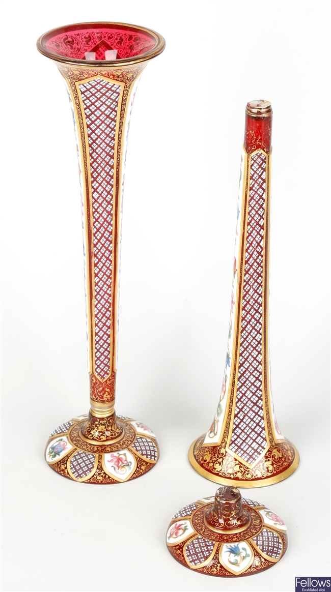 A pair of late 19th century Bohemian overlay (white on red) glass vases