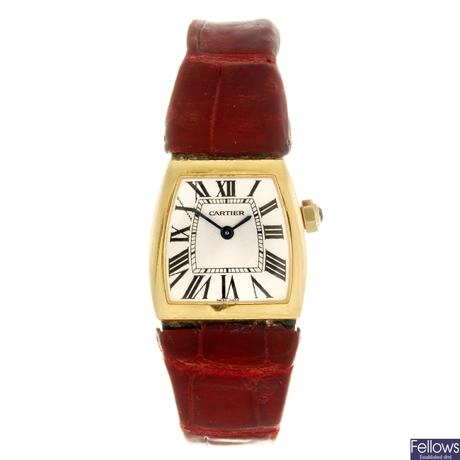 (0223203) An 18k gold quartz lady's Cartier La Dona wrist watch.