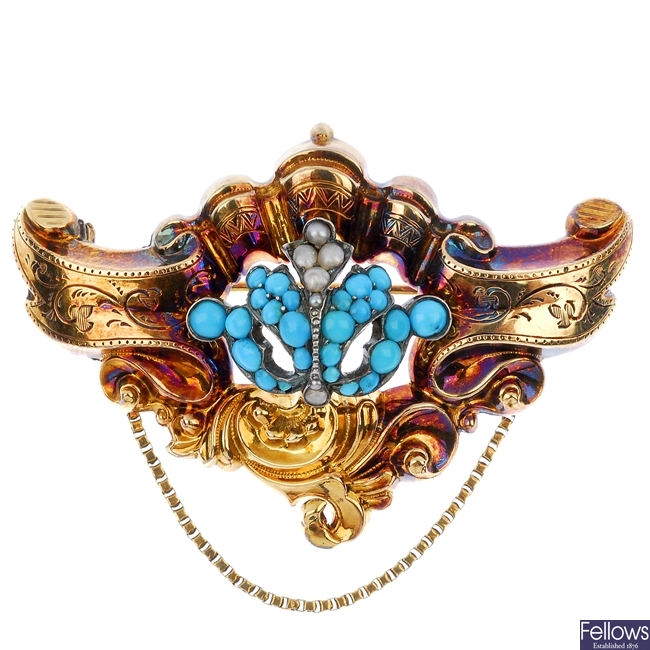 A mid 19th century 9ct gold turquoise and split pearl scrolling brooch.