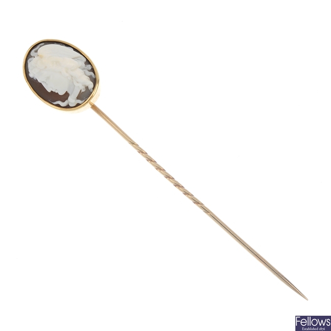 A late 19th century gold shell cameo stickpin.