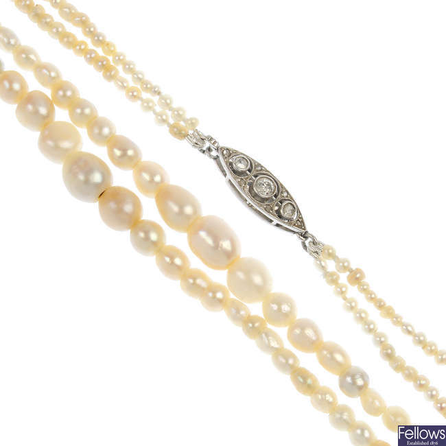 A natural pearl two-row necklace, with diamond clasp.