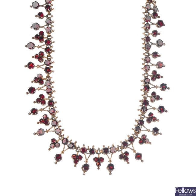 A late 19th century garnet necklace.