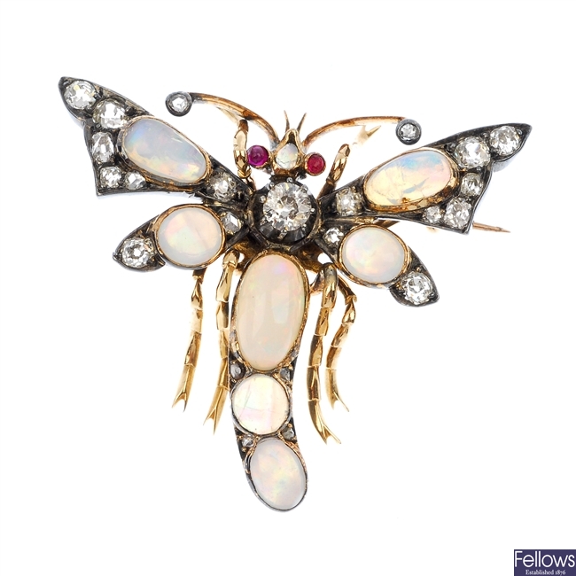 A late 19th century silver and 9ct gold diamond, opal and ruby dragonfly brooch.