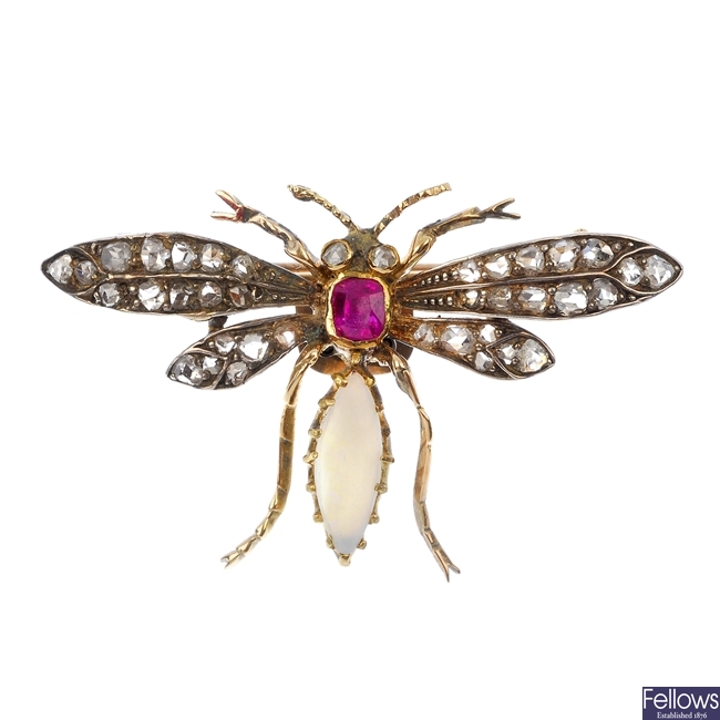 An early 20th century silver and gold, diamond and gem-set wasp brooch.