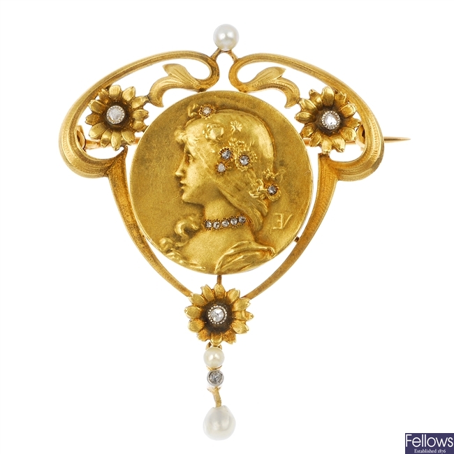 A French Art Nouveau 18ct gold diamond and seed pearl brooch.