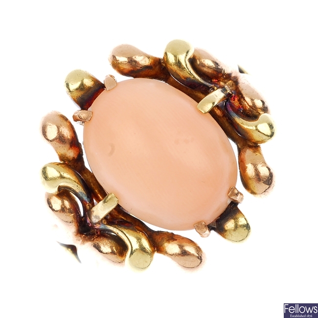 A mid 20th century gold coral ring.