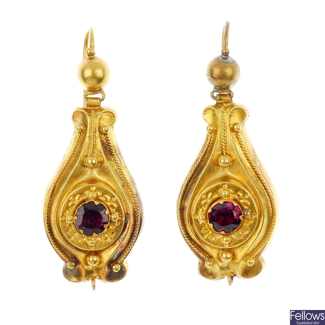 A pair of late 19th century garnet ear pendants.
