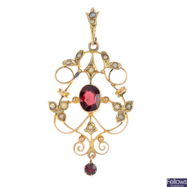 An early 20th century 15ct gold brooch and a gold garnet and seed pearl pendant.