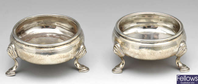A pair of George II silver open salts of cauldron form.