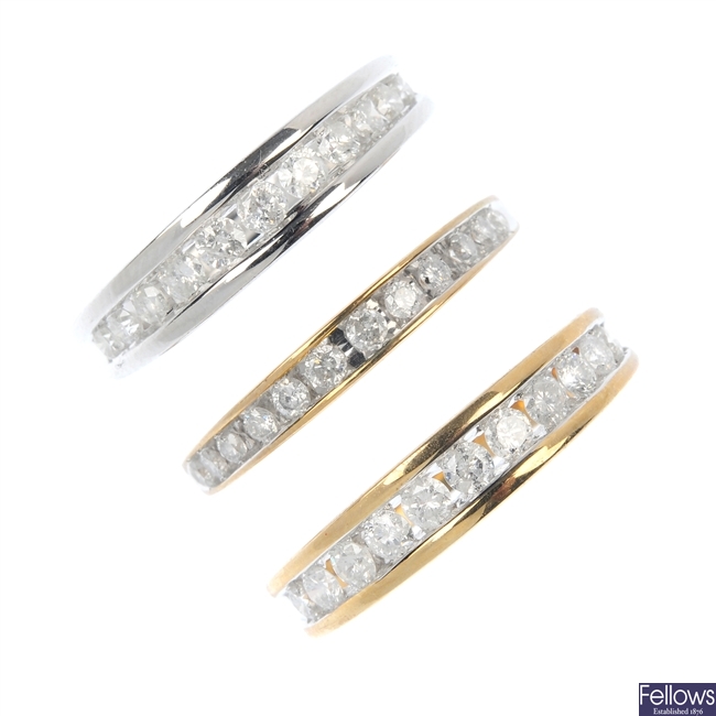 A selection of three 9ct gold diamond half-circle eternity rings. 