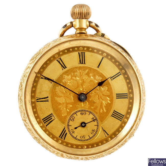 A yellow metal open face pocket watch with another pocket watch.