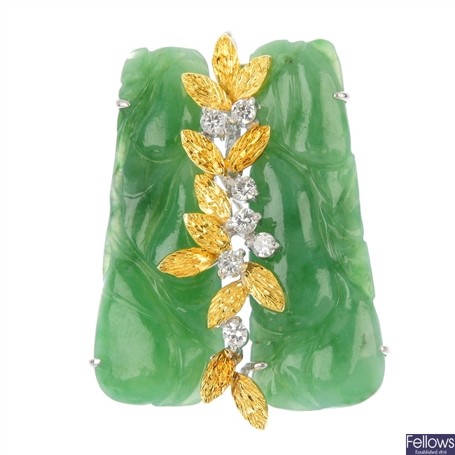 A mid 20th century jade and diamond pendant.