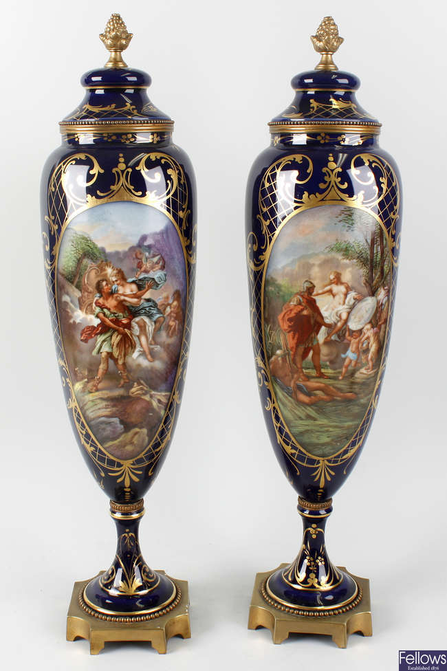 A good pair of 19th century Sevres style porcelain urns. 
