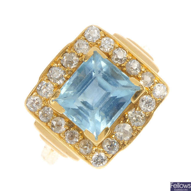 A mid 20th century 18ct gold aquamarine and diamond ring.