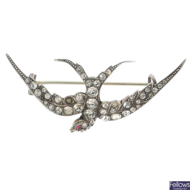 An early 20th century silver paste swallow brooch.