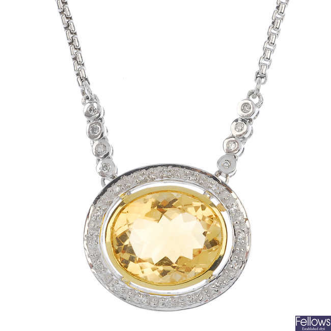 An 18ct gold citrine and diamond cluster necklace.