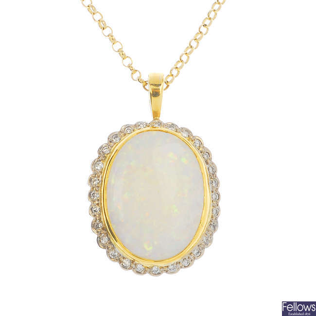An 18ct gold opal and diamond pendant, with 9ct gold chain.