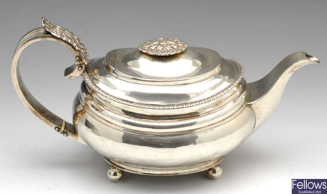A George IV silver teapot.
