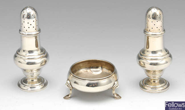 A George III silver open salt & a pair of Edwardian pepper pots.