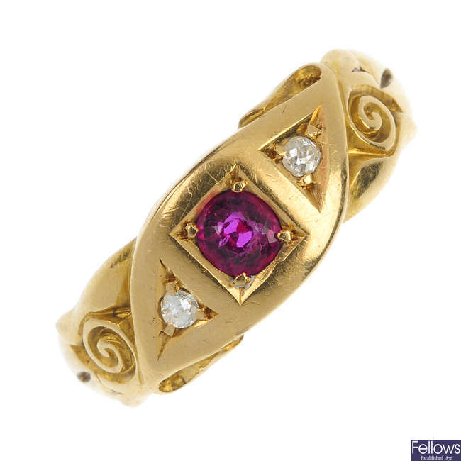 An early 20th century 18ct gold ruby and diamond band ring. 