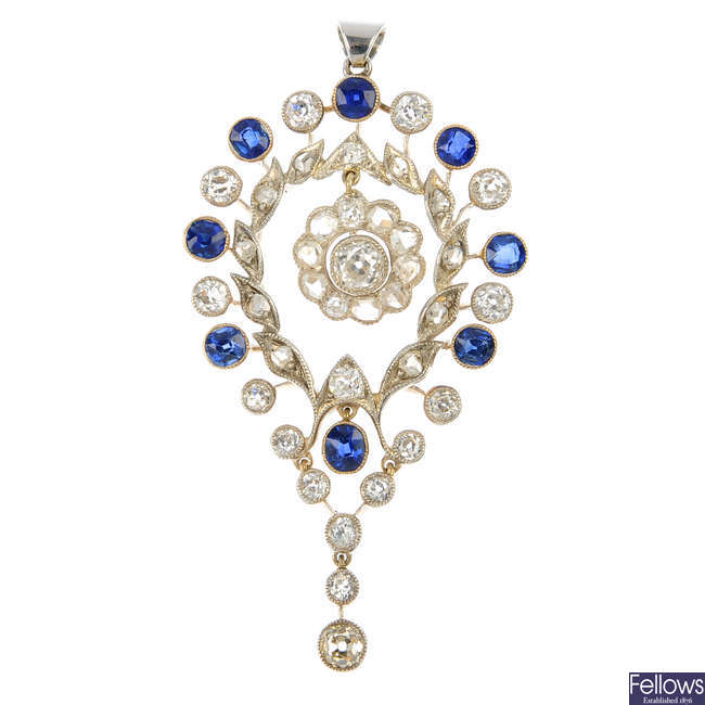 An early 20th century silver and 9ct gold sapphire and diamond pendant.