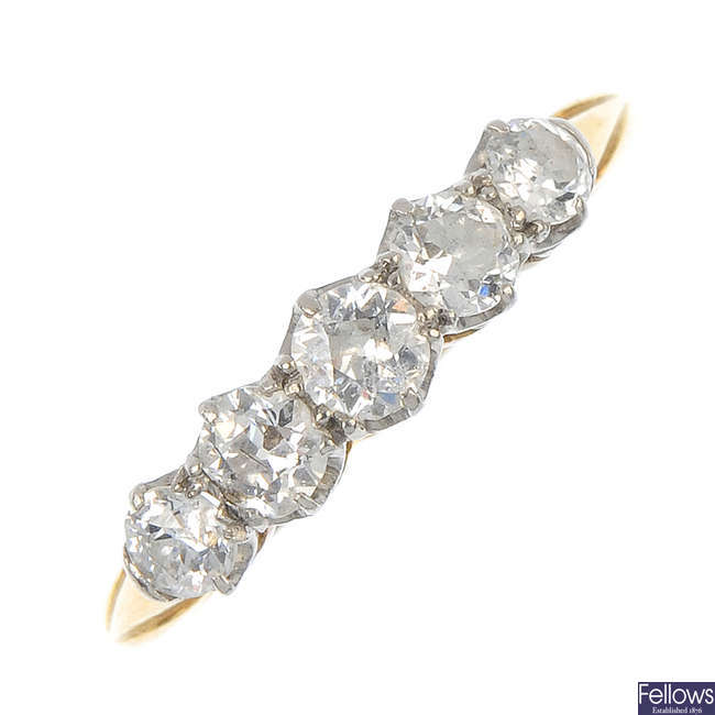 A mid 20th century platinum and 18ct gold diamond five-stone ring. 