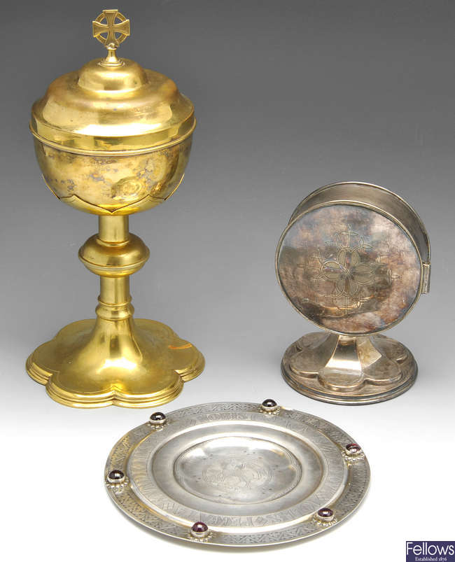 A Victorian silver paten, a later paten, two ciboria, a pyx box, etc.
