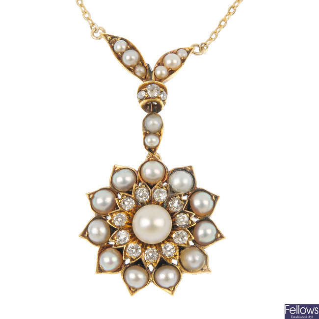 A cultured and split pearl and diamond necklace.