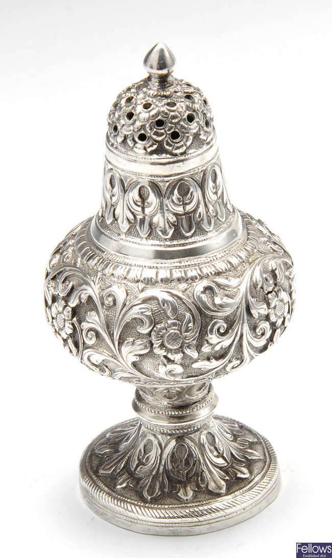 A late 19th century silver import caster.