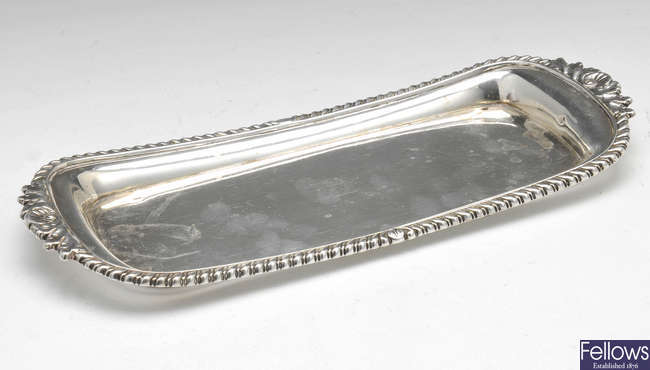 A George IV silver candle snuffer tray.
