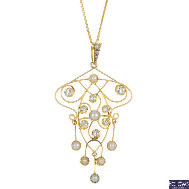 An early 20th century 15ct gold diamond and split pearl pendant.