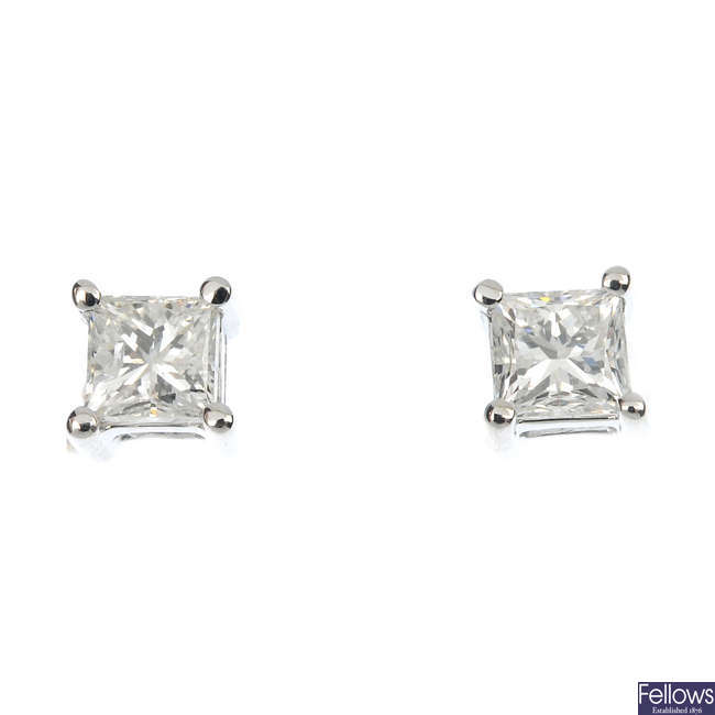 A pair of 18ct gold square-shape diamond single-stone ear studs.