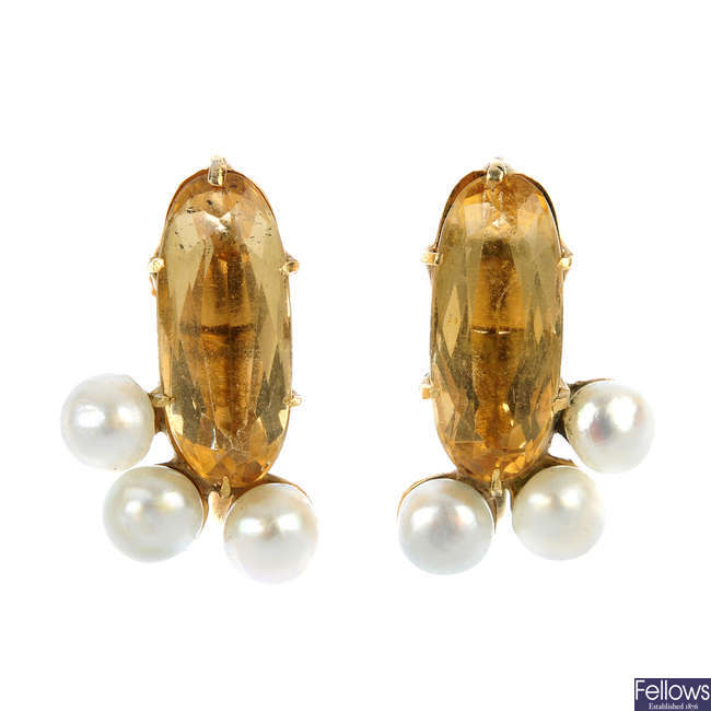A pair of topaz and cultured pearl earrings.