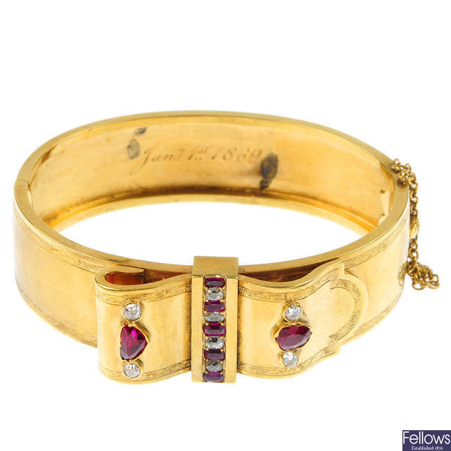A mid 19th century 15ct gold ruby and diamond bangle.