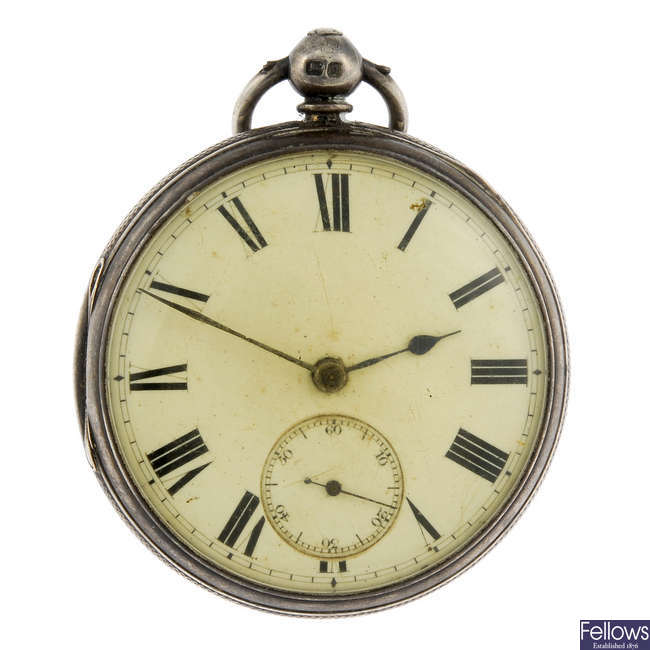 An open face pocket watch with silver chain and two vesta cases.
