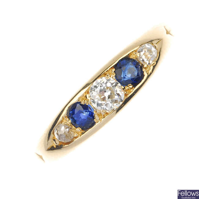 A late Victorian 18ct gold diamond and sapphire ring.