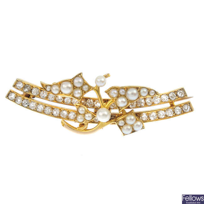 An early 20th century 15ct gold seed pearl and diamond brooch.