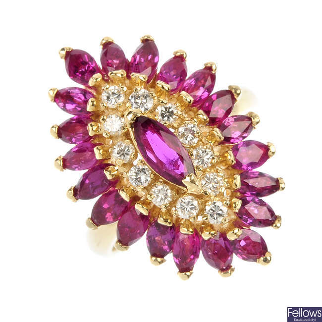 A ruby and diamond cluster ring.