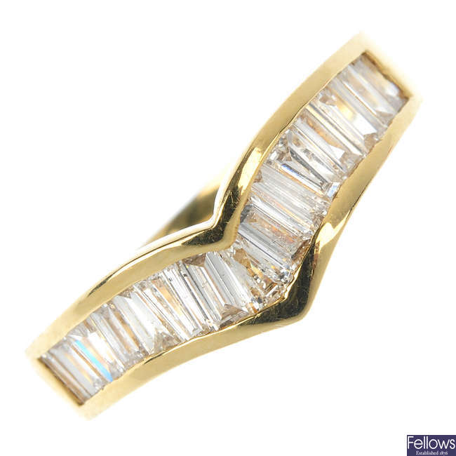 An 18ct gold diamond wishbone ring.