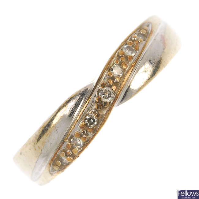 A 9ct gold diamond crossover ring.